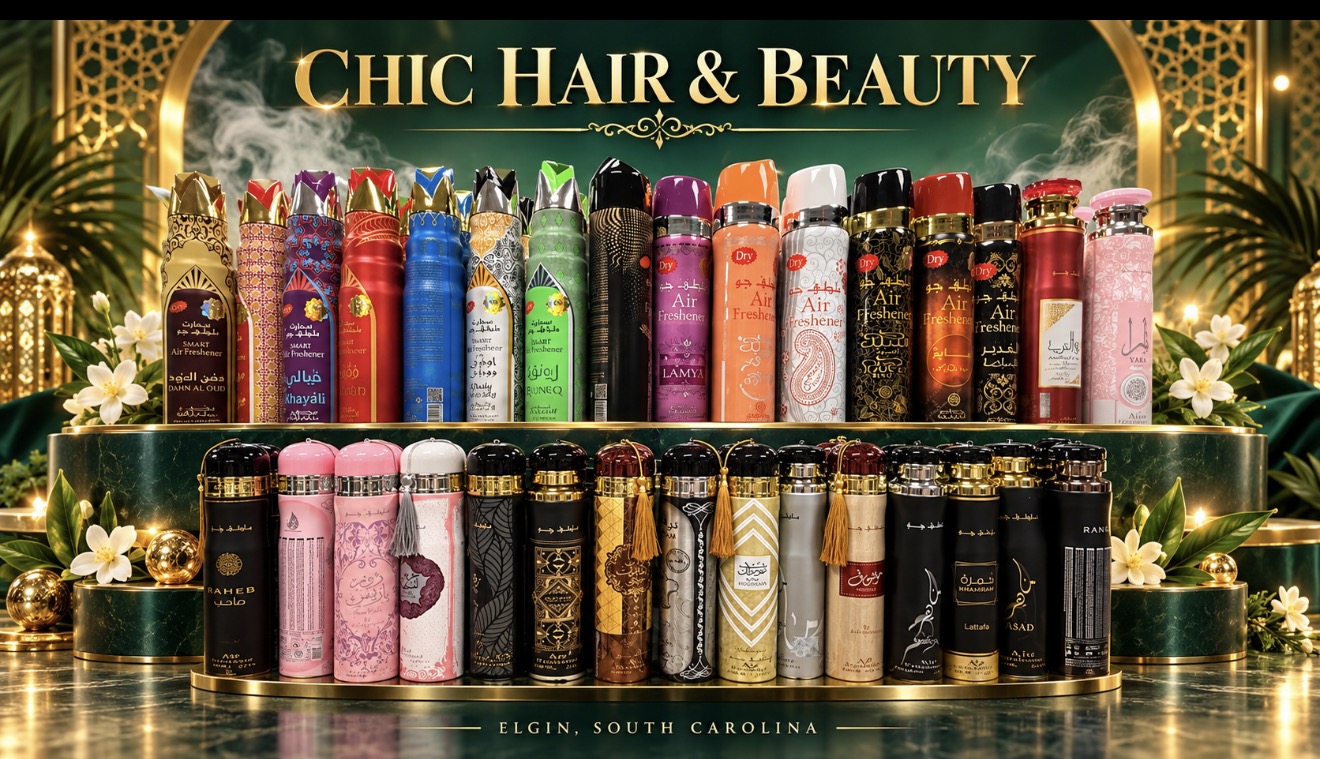 Air fresheners and fragrance sprays on an emerald and gold display at Chic Hair and Beauty