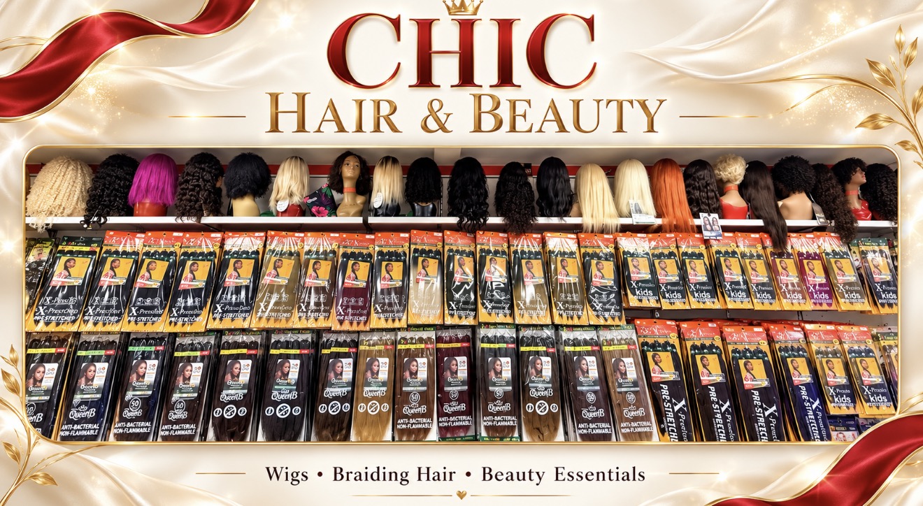Wigs and packaged braiding hair on display at Chic Hair and Beauty